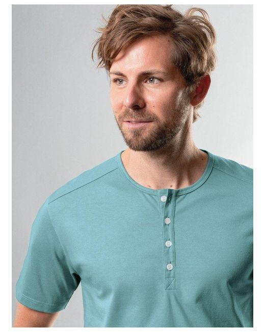 Trigema T-Shirt mit Knopfleiste DELUXE Baumwolle (1-tlg) in Green für Herren