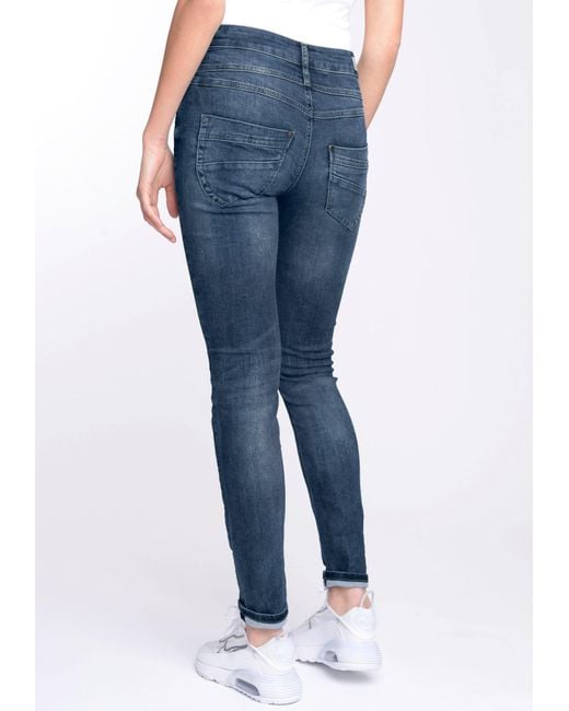 mit und Gang Blau | 94MORA DE 3-Knopf-Verschluss Passe vorne Skinny-fit-Jeans in Lyst