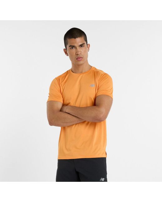 New Balance Laufshirt Sport Essentials T-Shirt mit Streifendesign in Orange für Herren