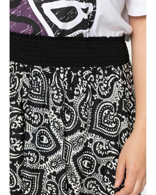 Sheego Black A-Linien-Rock Große Größen mit Alloverdruck, in Zipfelform