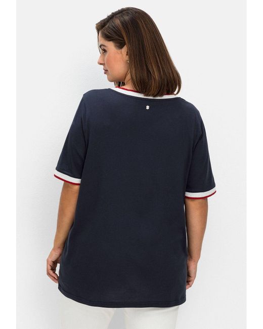 Sheego T-Shirt Große Größen mit Wordingprint und Kontrastbündchen in Blau |  Lyst DE