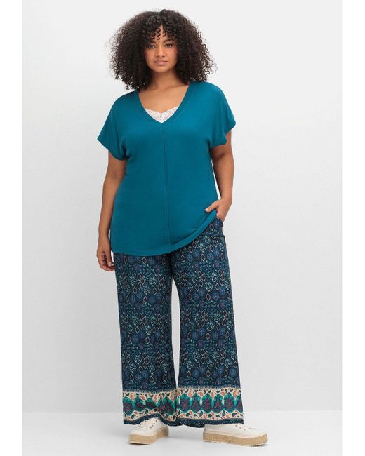 Sheego Blue T-Shirt Große Größen mit V-Ausschnitt und Zierpaspel vorn