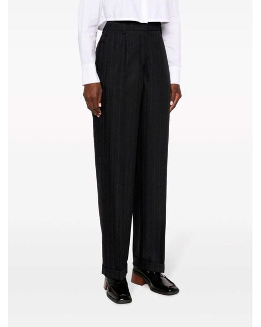 Pantalones rectos a rayas diplomáticas Miu Miu de color Black