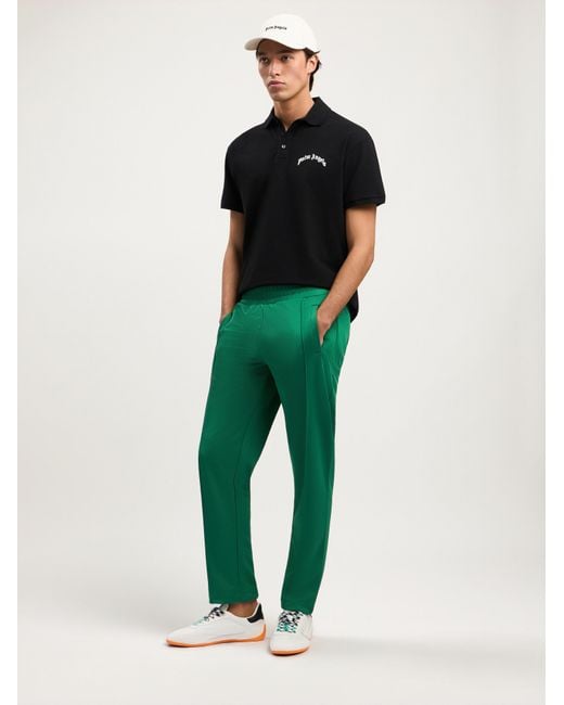 Palm Angels Green Back Curved Logo Track Pants for men