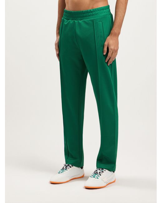 Palm Angels Green Back Curved Logo Track Pants for men
