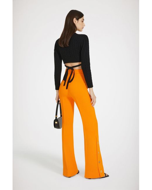 Patou Orange Button-Hem Flared Trousers