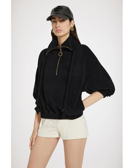 Sweatshirt à col zippé en jersey éponge de coton bio Patou en coloris Black