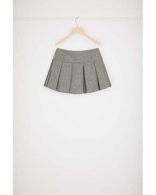 Jupe courte plissée en laine texturée Patou en coloris Gray