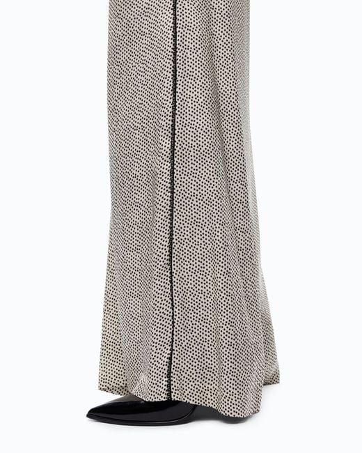 Pinko White Flared Polka-Dot Satin Trousers