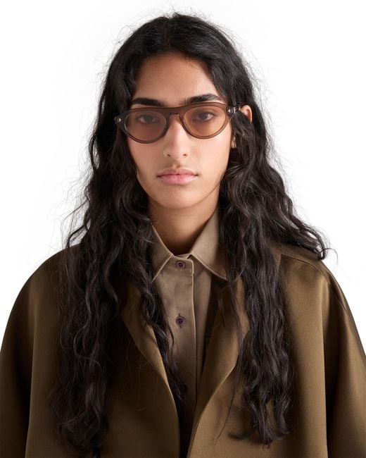Prada Pink Sunglasses With Iconic Metal Plaque