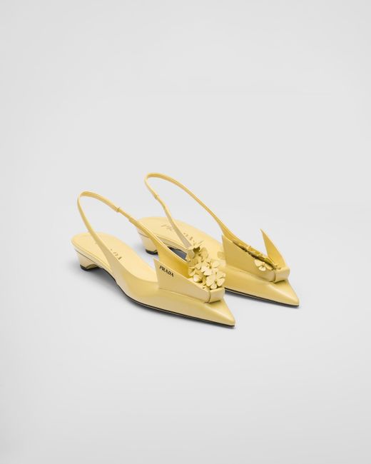 Prada Metallic Brushed Leather Slingback Pumps With Floral Appliques