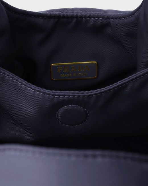 Mini Sac En Re-Nylon Matelassé Avec Nœud Prada en coloris Blue