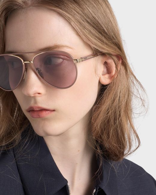 Prada Pink Sunglasses With The Iconic Metal Plaque