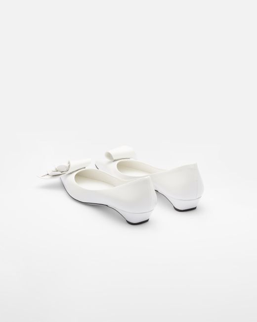 Prada White Brushed Leather Pumps With Floral Appliqués