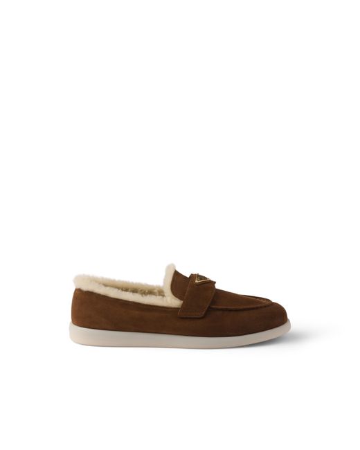 Mocasines con logo triangular Prada de color Brown