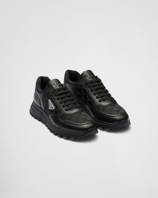 Prada Black Leather And Re-nylon High-top Sneakers for men