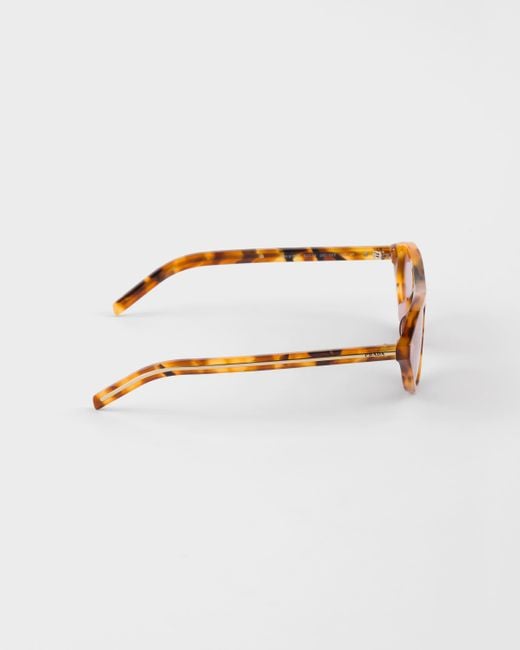 Prada Pink Sunglasses With The Iconic Metal Plaque