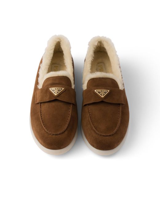 Mocasines con logo triangular Prada de color Brown