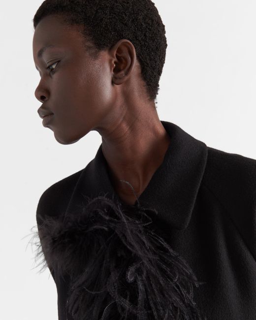Coat with deals feathers