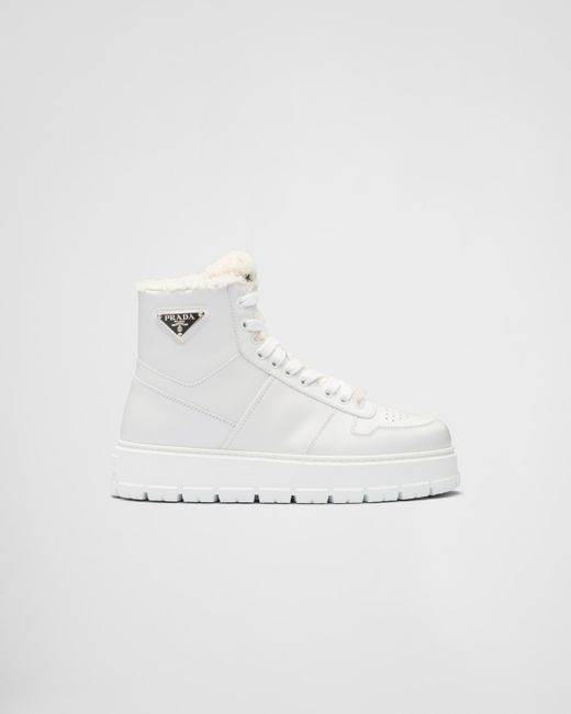 Sneakers Alte In Pelle E Montone di Prada in White