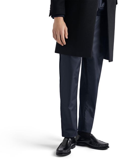 Pantalones Con Logo Triangular Prada de hombre de color Blue