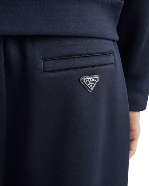 Pantalones Con Logo Triangular Prada de hombre de color Blue