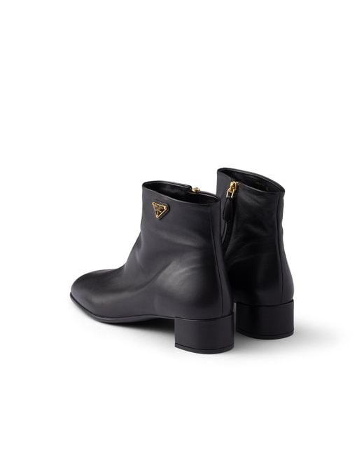 Tronchetti di Prada in Black