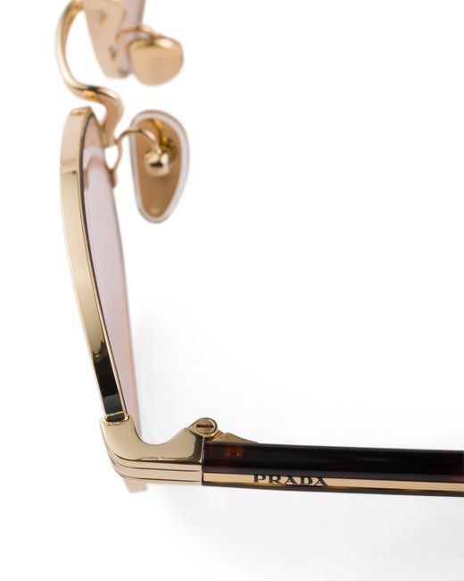 Prada Pink Sunglasses With The Iconic Metal Plaque