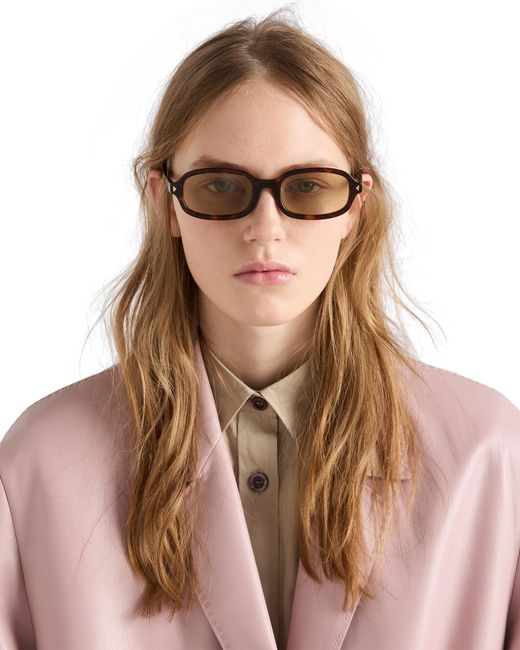 Prada White Sunglasses With The Iconic Metal Plaque