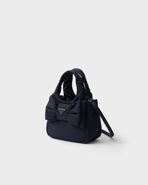 Mini Sac En Re-Nylon Matelassé Avec Nœud Prada en coloris Blue
