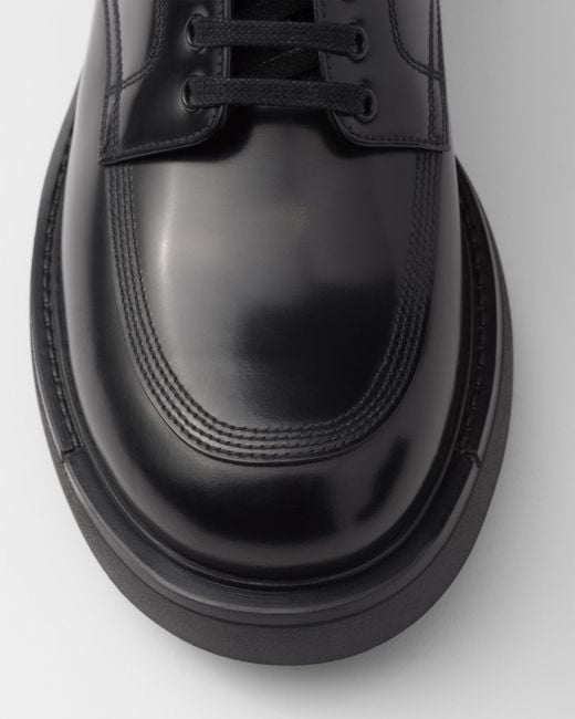 Prada Black Brushed Leather Derby Shoes for men