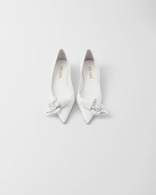 Prada White Brushed Leather Pumps With Floral Appliqués