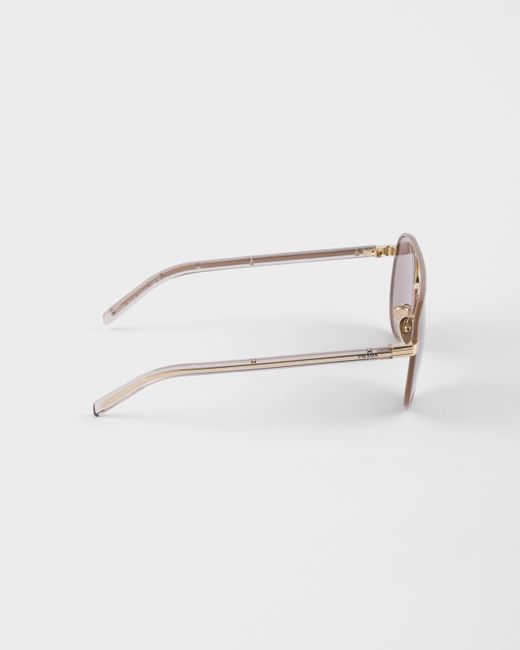 Prada Pink Sunglasses With The Iconic Metal Plaque