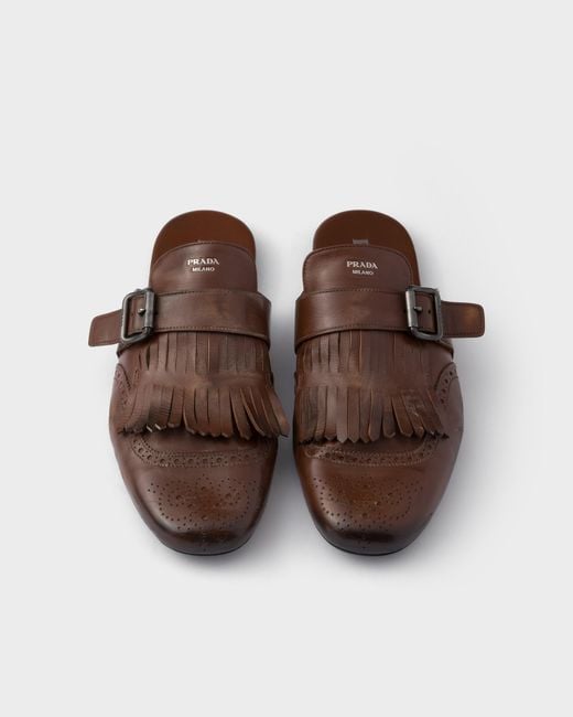 Mules En Cuir Effet Vieilli Shuffle Avec Bride À Boucle Et Frange Prada pour homme en coloris Brown