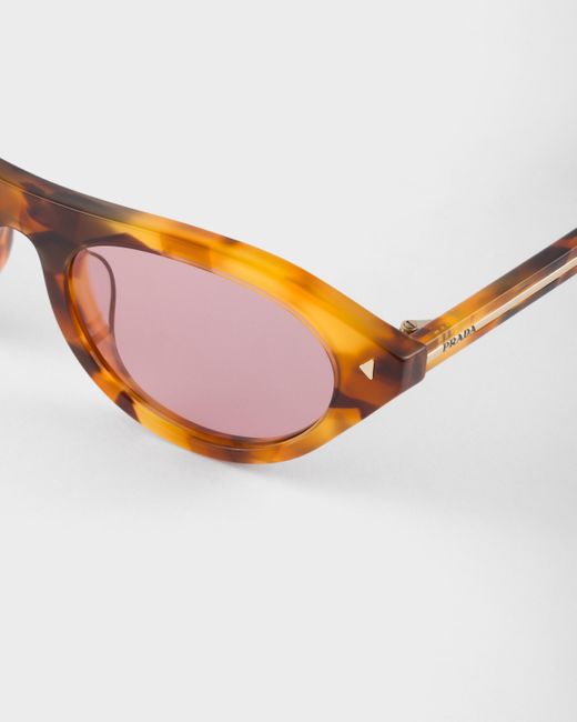 Prada Pink Sunglasses With The Iconic Metal Plaque