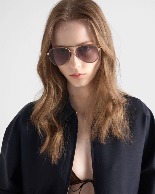 Prada Pink Sunglasses With The Iconic Metal Plaque