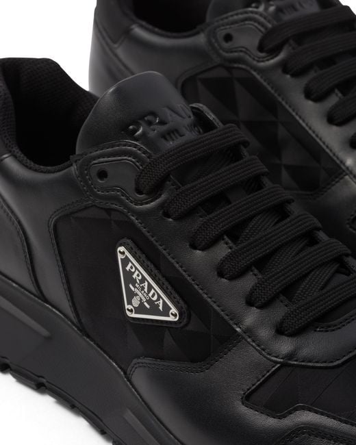 Prada Black Re-Nylon Brand-Plaque Leather And Nylon High-Top Trainers for men