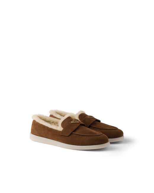 Mocasines con logo triangular Prada de color Brown
