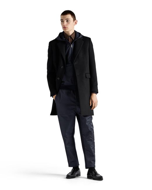 Pantalones Con Logo Triangular Prada de hombre de color Blue
