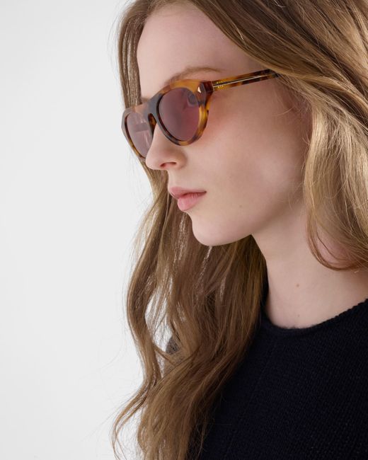 Prada Pink Sunglasses With The Iconic Metal Plaque