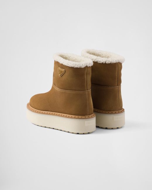 Bottines En Daim Et Shearling Prada en coloris Brown