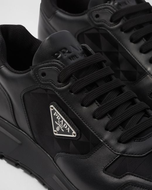 Prada Black Leather And Re-nylon High-top Sneakers for men