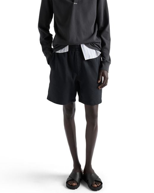 Prada Black Crisscross Rubber Slides for men
