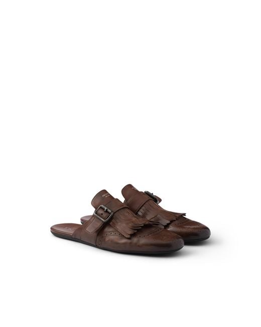 Prada Brown Shuffle Antiqued Leather Mules With Buckled Strap And Fringe for men