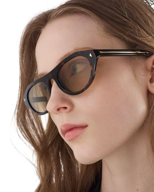 Prada Multicolor Sunglasses With The Iconic Metal Plaque