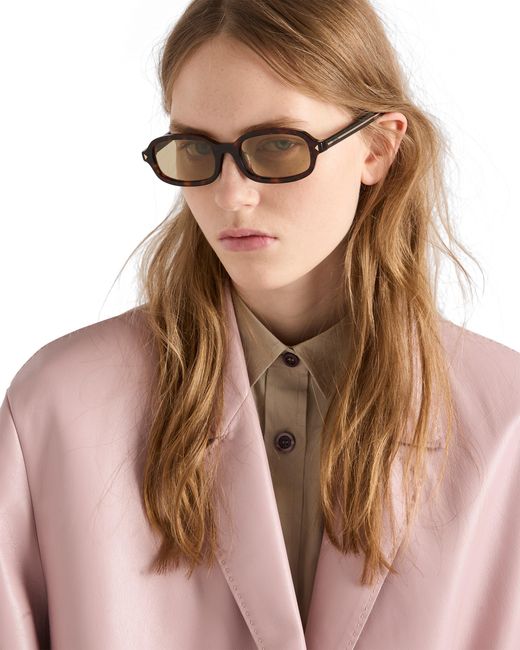 Prada White Sunglasses With The Iconic Metal Plaque