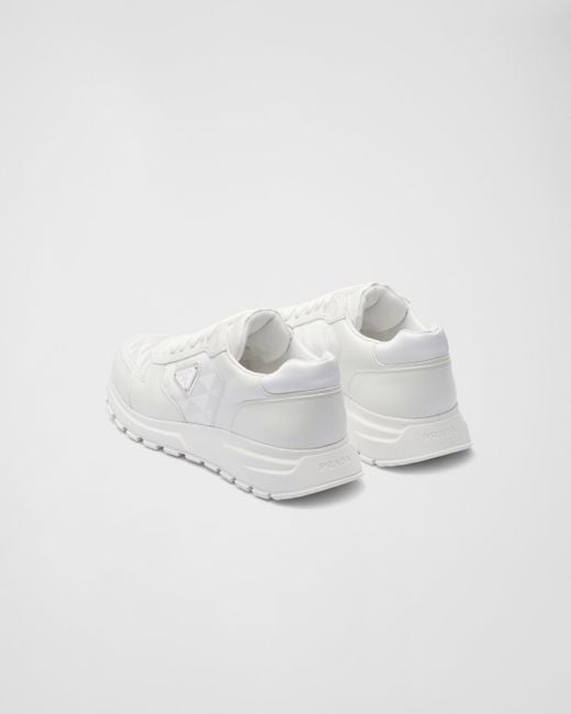 Sneakers Alte di Prada in White da Uomo