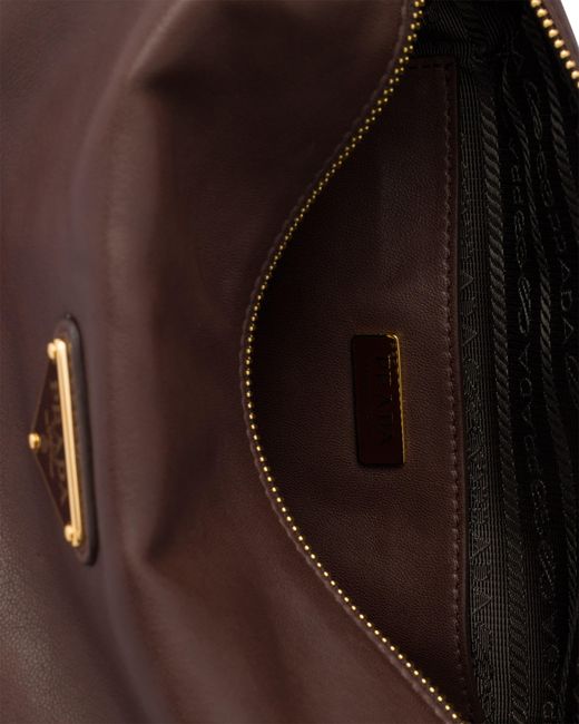 Borsa Explore Small di Prada in Brown