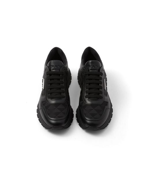 Prada Black Re-Nylon Brand-Plaque Leather And Nylon High-Top Trainers for men