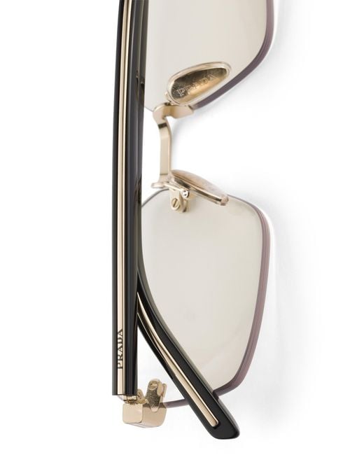 Prada White Sunglasses With The Iconic Metal Plaque for men